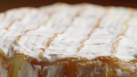 savory cheese is crafted through a meticulous process showcasing rich textures and flavors. this artisan method highlights the craftsmanship behind delightful dairy products.