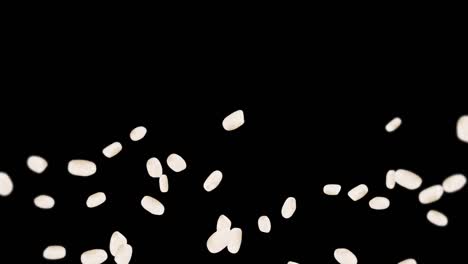 flying many rice on black background. white rice grains. glutinous rice. vegetarian. healthy food. 3d loop animation of rice rotating.