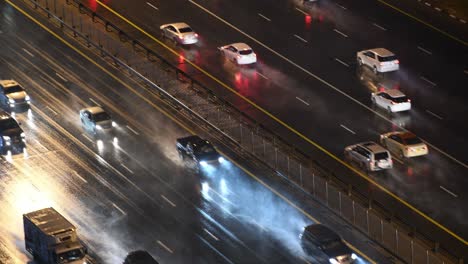 Cars-driving-on-the-highway-during-heavy-rain