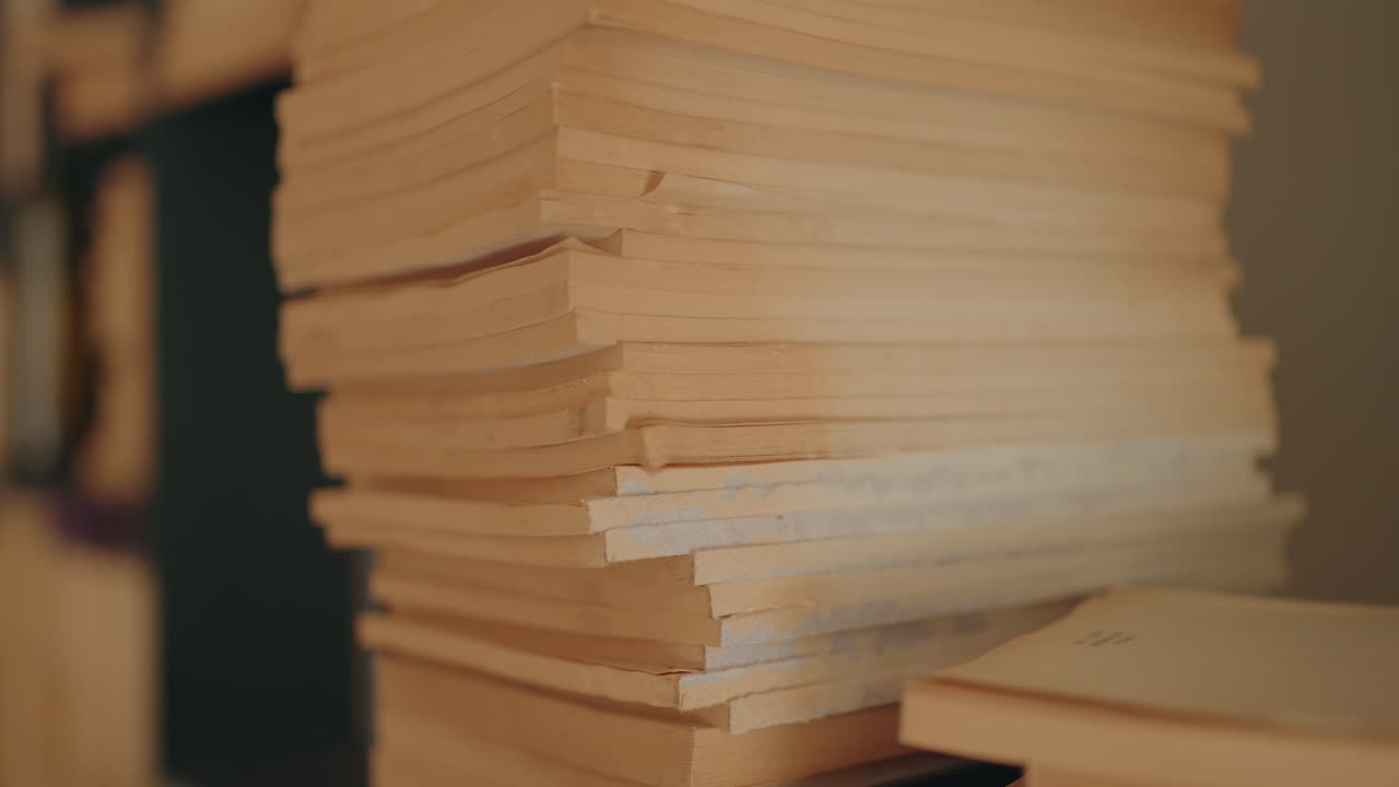 Close up of stacked aged papers and documents creating vintage texture