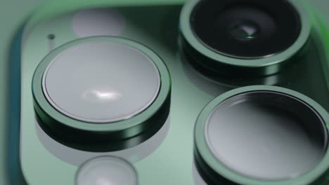 close-up of a green smartphone case with camera lenses