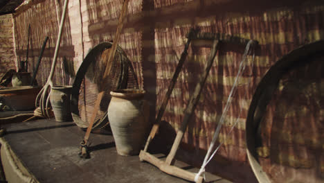 slow motion shot of medieval artifacts and products at a village fair in southern spain during the morning sun