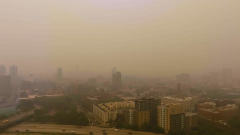 Canadian-wildfire-smoke-creates-hazy-skies-and-poor-air-quality-in-New-York-City---Drone-shot