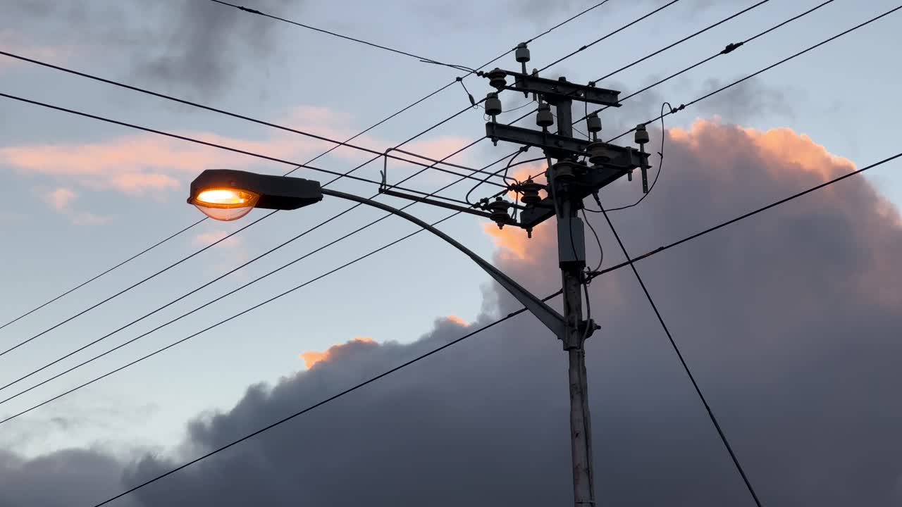 A street light in the streets of Cape Town, South Africa at dusk.