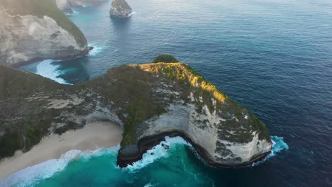 Aerial-view-of-Nusa-Penida-Indonesia---The-Iconic-Kelingking-T-Rex-Beach---Popular-Tourist-Travel-Destination-Beautiful-Nature-Landscape-near-Bali