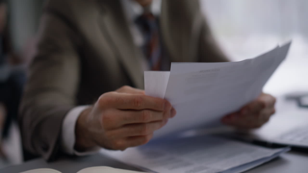 Pensive startuper pondering idea sitting by office panoramic window closeup