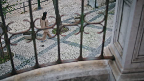 urban girl exploring town street at weekend alone. unrecognizable woman walking