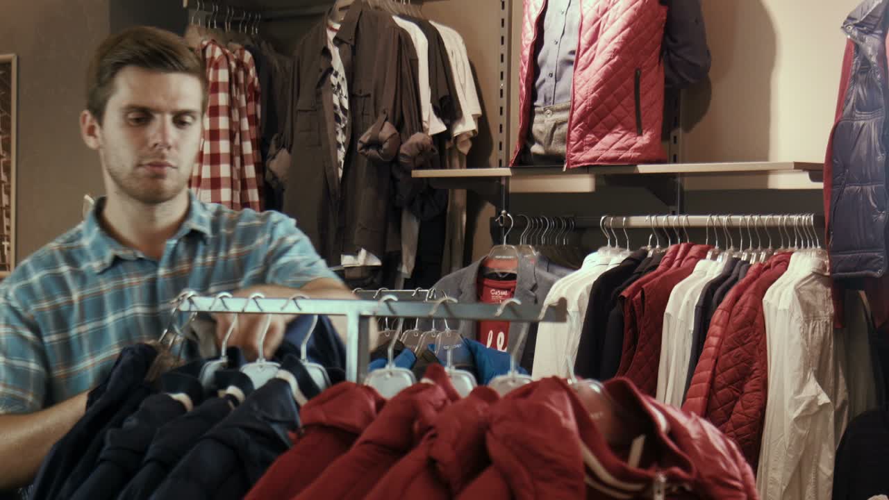 Man shopping for clothes in a store