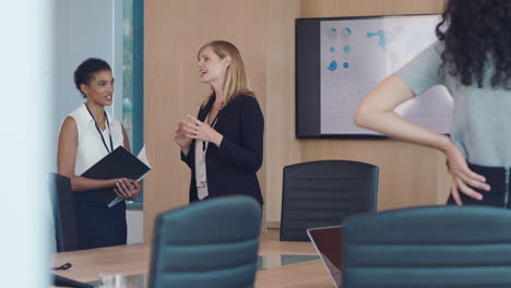 business women, talking or office boardroom