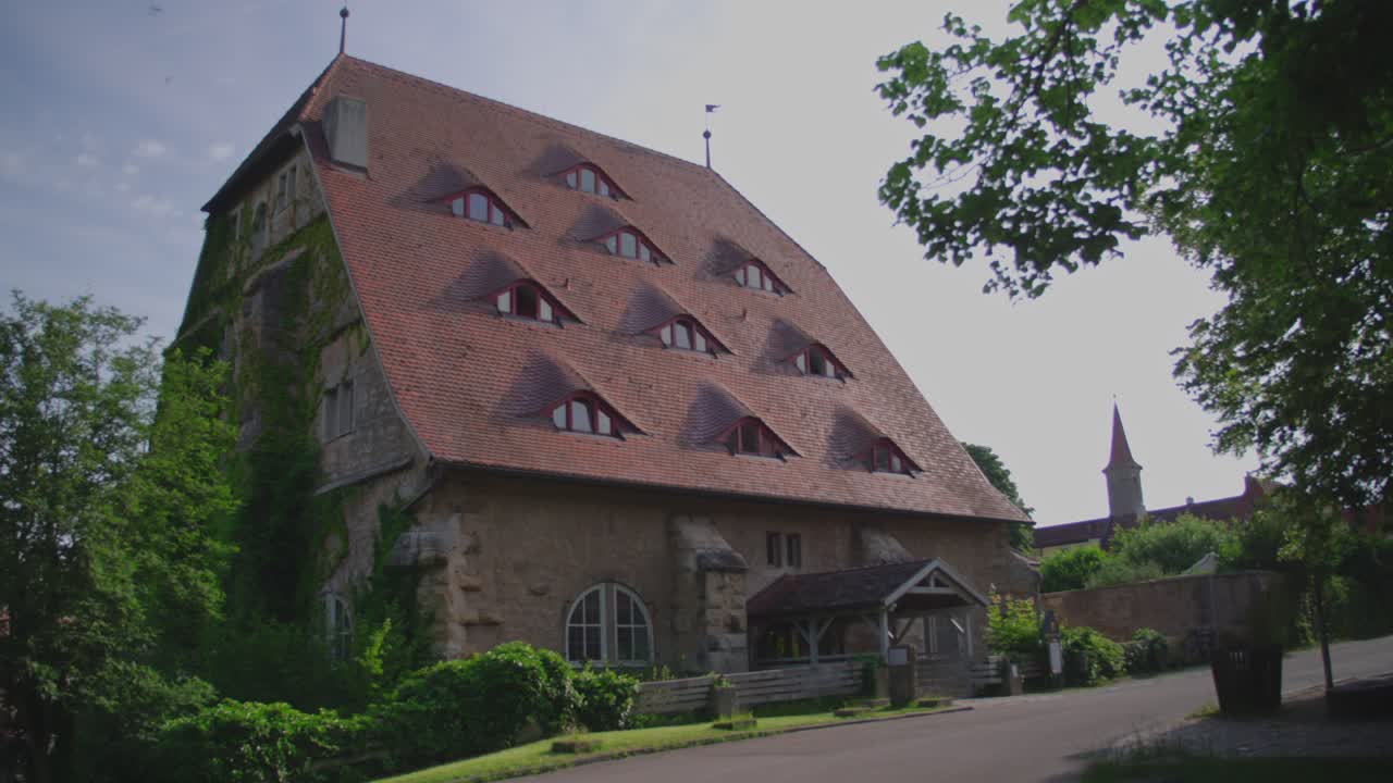 Old building with a unique roof design in Rothenburg ob der Tauber, Germany