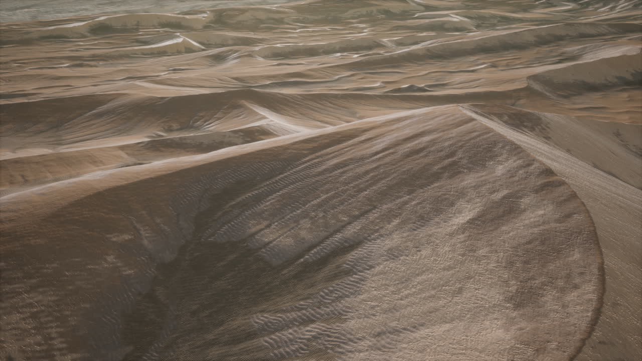 dunas de arena roja del desierto al atardecer
