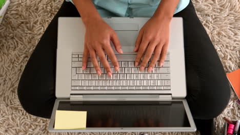 casual businesswoman working on her laptop