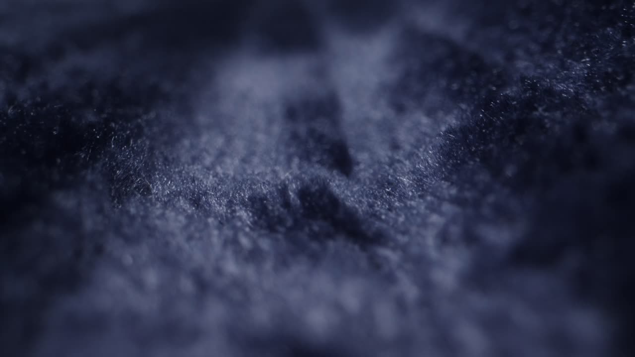 Close-up view of dark blue fabric texture