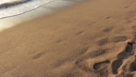 ocean waves over sandy beach in mexico holiday destination