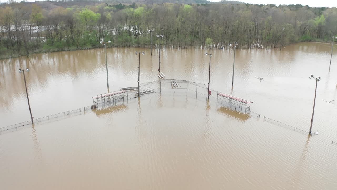 Flooded outdoor sports center baseball court, aerial drone Alabama America USA