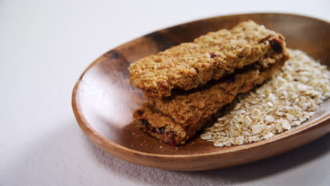 granola bar and oatmeal in bowl 4k