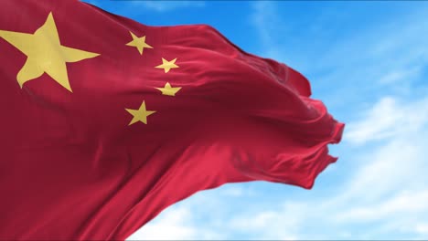 la bandera nacional de china volando en el viento