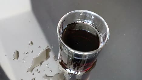 stop motion animation of filling glass with tea