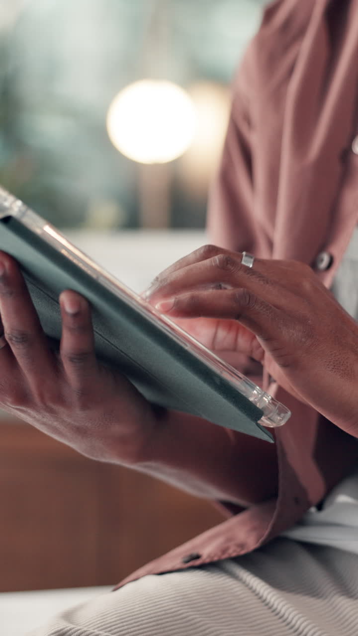 Close Up of Hands Typing and Swiping on a Digital Tablet