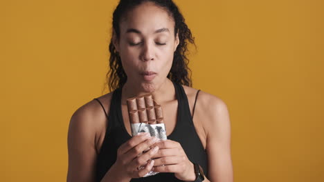 African-american-woman-over-yellow-background.