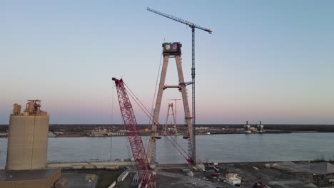 panoramic shot of both suspensions towers gordie howe brigde in line, american side, detroit, michigan