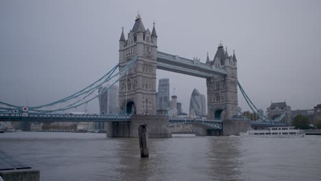 static shot of the famous tower bridge and skyscraper 30 st mary axe, cloudy day