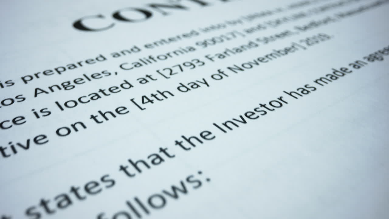 Document with english text. Rubber stamp making seal on financial document