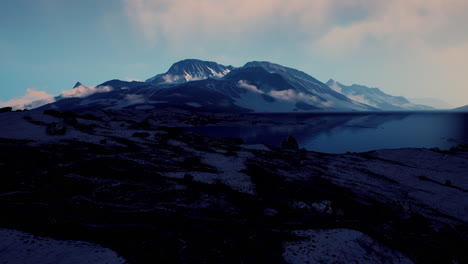 Spectacular-scenery-of-rocky-mountain-range-covered-with-snow