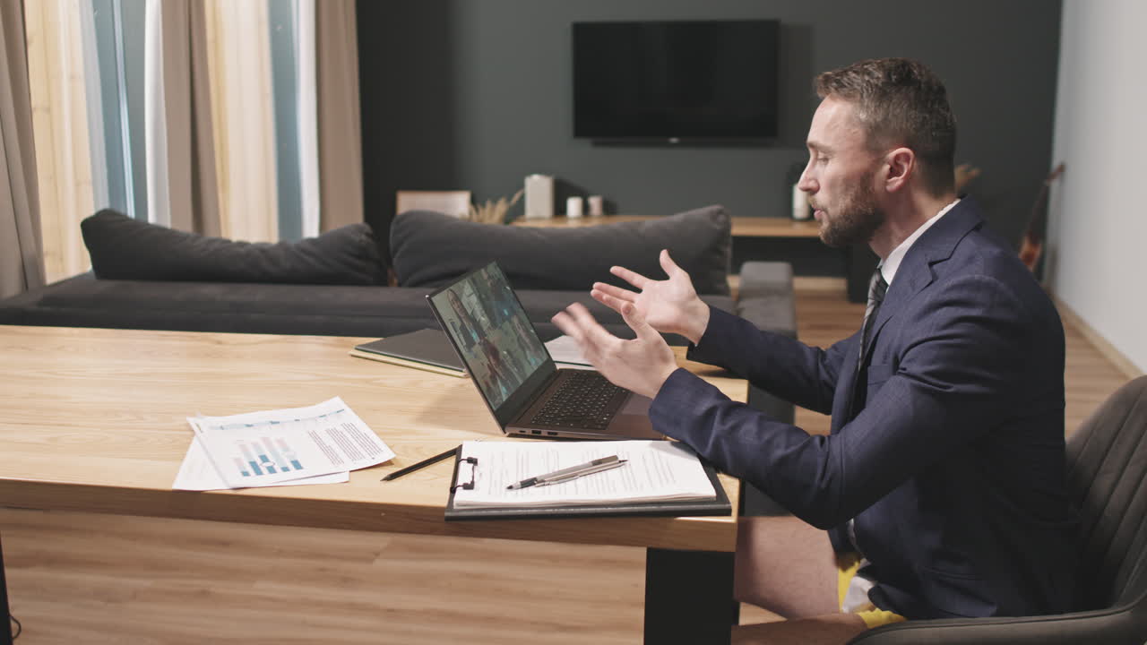 Business Man Having Video Meeting With Partners