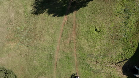 aerial view of a mountain biker on a trail