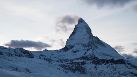 famous matterhorn mountain in morning hours at sunrise, winter wonderland at swiss alps zermatt glacier ski resort