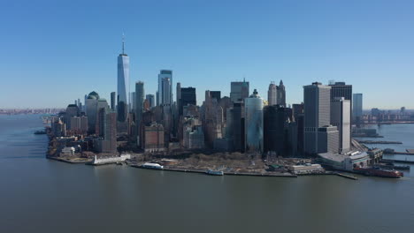 an aerial view of new york harbor on a sunny day with blue skies