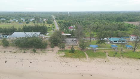 Beautiful Aerial Drone View Summer At Tanjung Kembang Water Park Beach Kabong , White Sandy Beaches, Coconut,And Palm Oil Plantation,Longe House,Homestay,Seratok,Sarawak,Borneo.