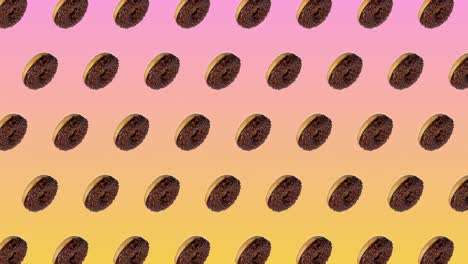 abstracta animación colorida - vista lateral rosquillas con chocolate se mueven hacia el lado en fondo de gradiente rosa-amarillo - bucle sin costuras.