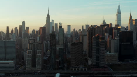 High-rise-buildings-in-midtown.-Iconic-Empire-state-building-towering-above-surrounding-development.-Manhattan,-New-York-City,-USA