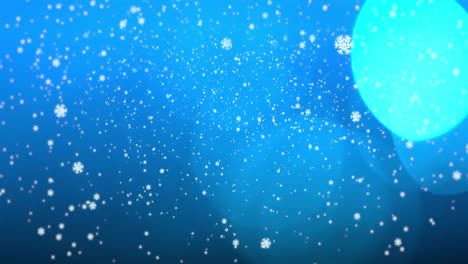 animation of snowflakes falling and spot lights on blue background