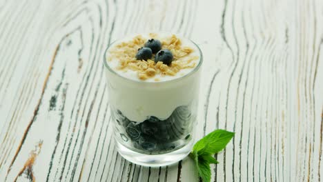 yogurt with blackberry in glass