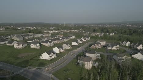 aerial drone view of houses in local neighborhood