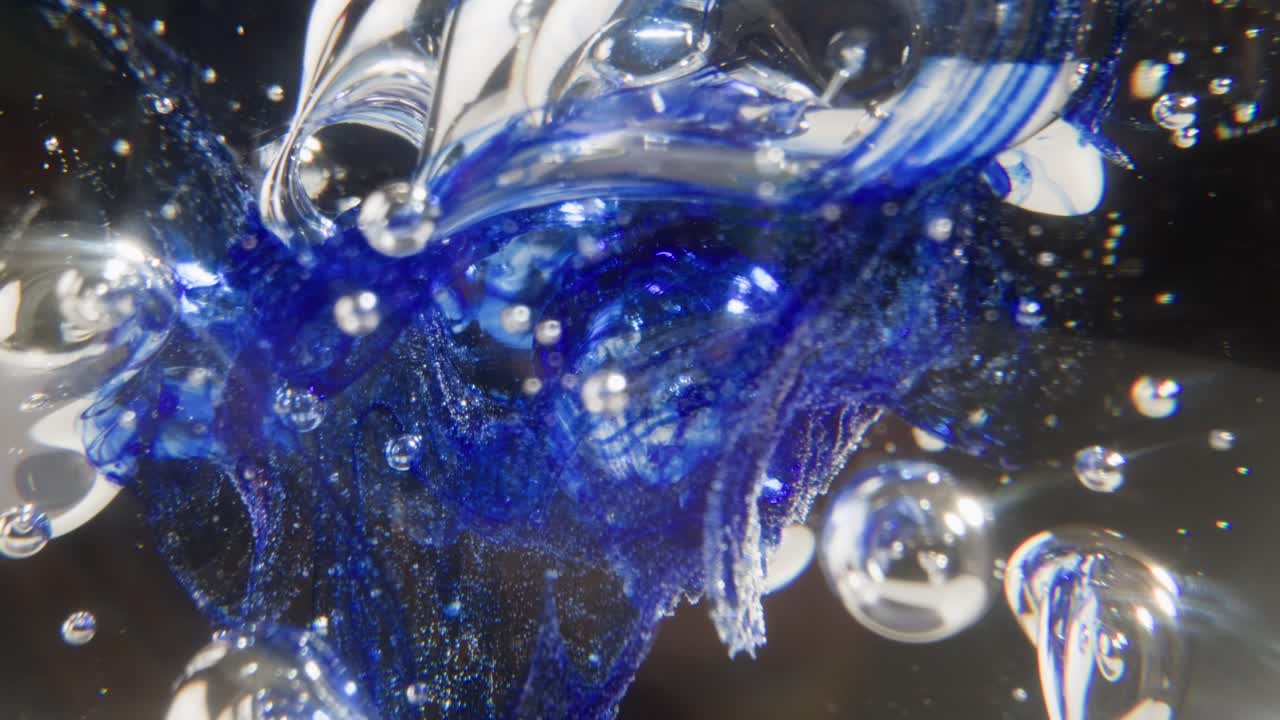 Dynamic Abstract Blue Liquid with Reflective Bubbles