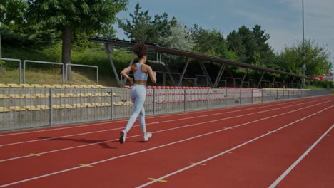 woman running on a track