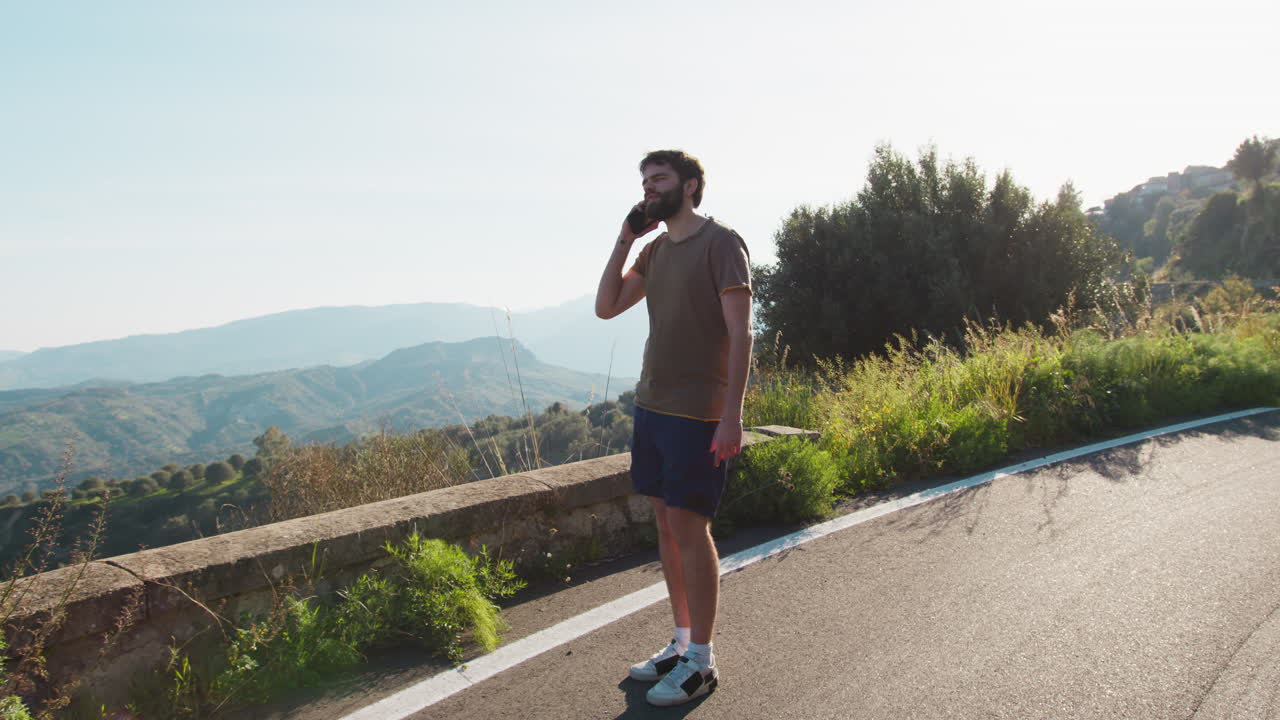 Young Athlete Receives A Call During Outdoor Training