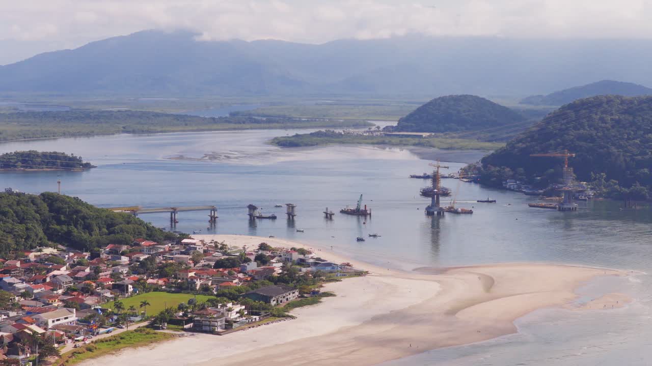 Distanced panorama aerial view of the new working project of Guaratuba-Caiobá Bridge, South America, Paraná, Brazil