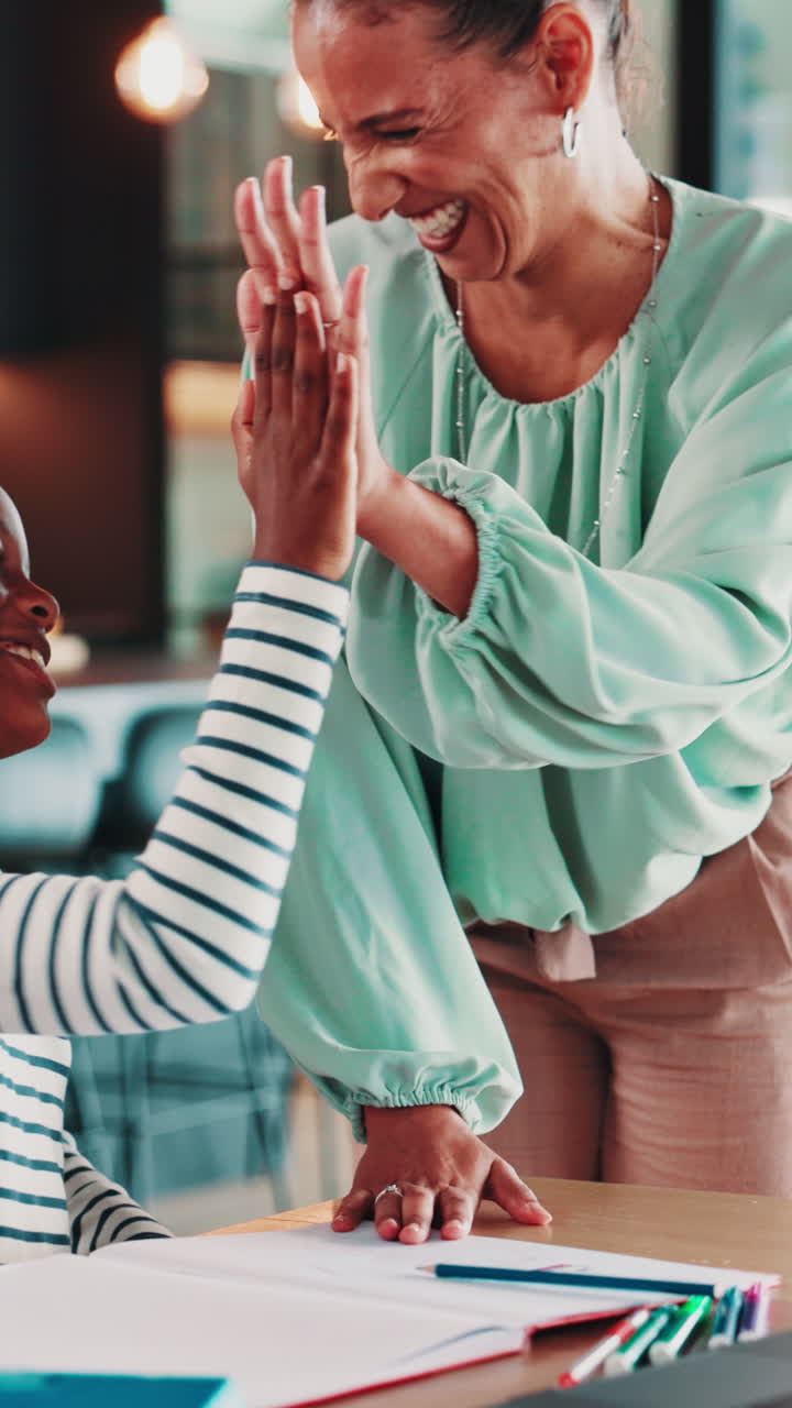 Happy Woman and Child High-Fiving While Drawing Together