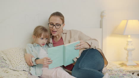 mother and daughter reading together