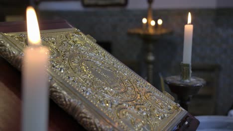 Holly-book-and-candles-in-church