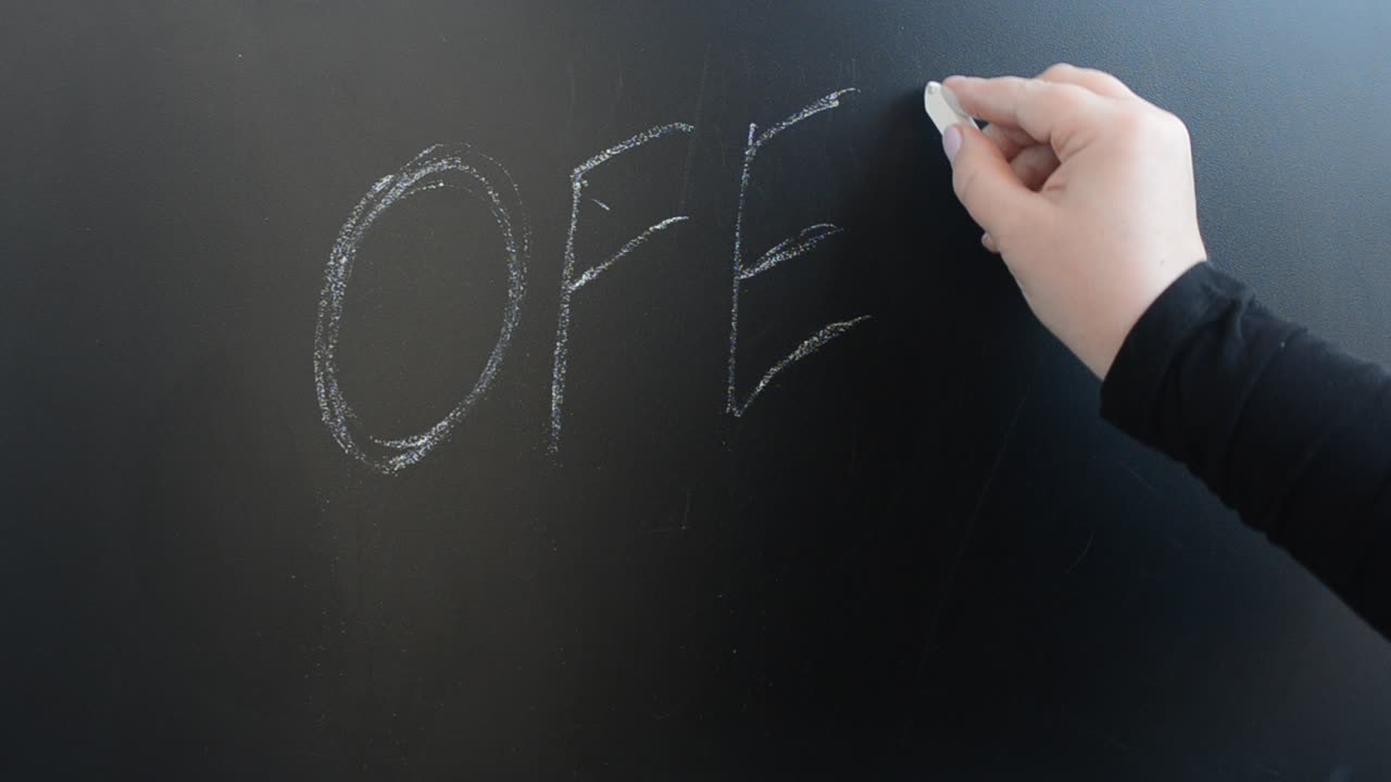 Discount text on a board. We write with chalk on a board