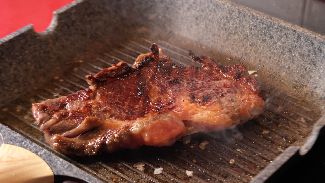 Barbecue Aged Roast Beef cooking on pan