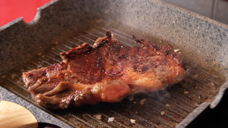 barbecue aged roast beef cooking on pan