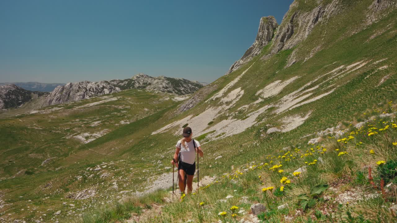 Hikers exploring scenic trail at Durmitor National Park, Montenegro