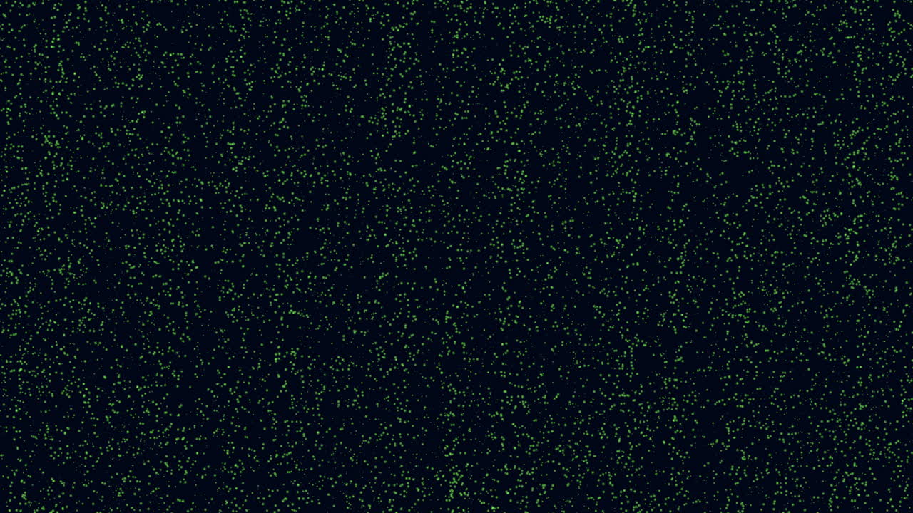 Motion small green glitters and dust on dark space